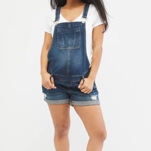 INDIGO BLUE SIDE PANEL DESTRUCTED MATERNITY SHORTALLS